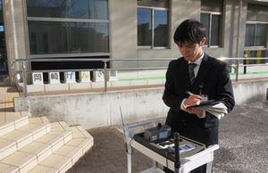 写真：今井さんの計測姿