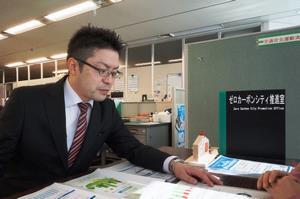 写真：菅沼さんの業務姿